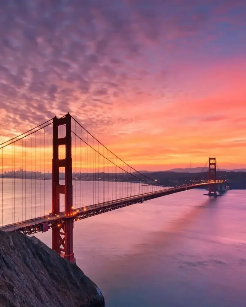Witness the beauty and strength of the Golden Gate Bridge in San Francisco, an iconic symbol of architectural elegance and engineering excellence, spanning the waters of the bay with vibrant orange hues and timeless allure.