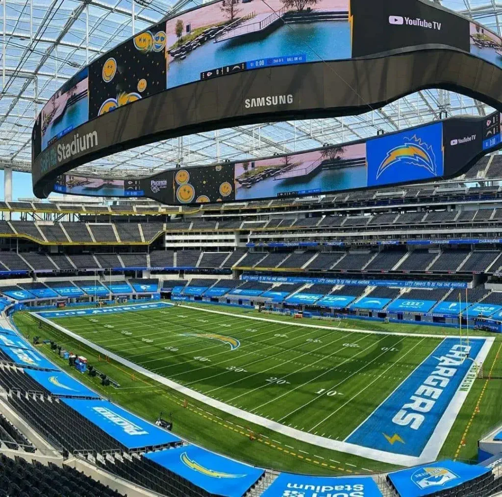 Experience the excitement of SoFi Stadium, a dynamic venue that hosts unforgettable sports events and entertainment spectacles, setting new standards for fan engagement and entertainment.